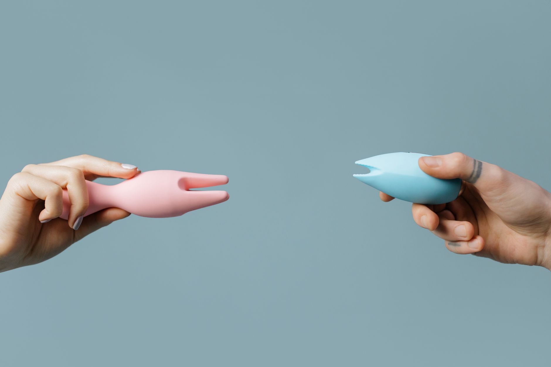 Two fresh lemons held in cupped hands, symbolizing self-care and renewed touch